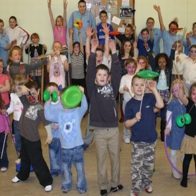 Children enjoying circus skills with Jolly Good Productions
