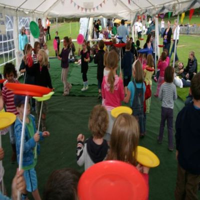 Plate spinning at a Jolly Good Productions circus workshop