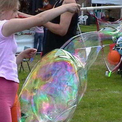 A colourful giant bubble made during a workshop