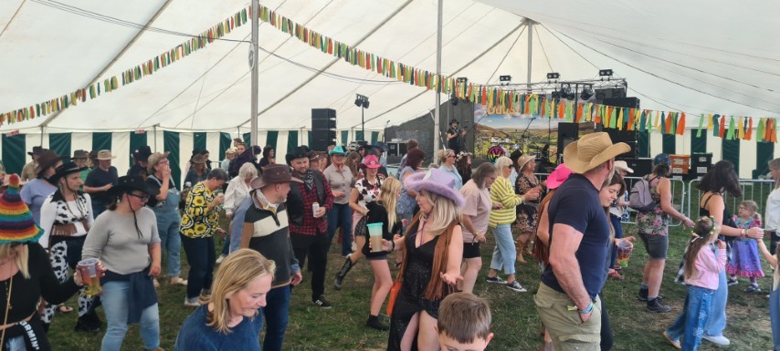 Hazel demonstrating leading the line dancing