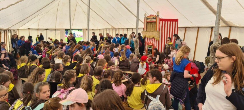 Children enjoying a Punch and Judy performance