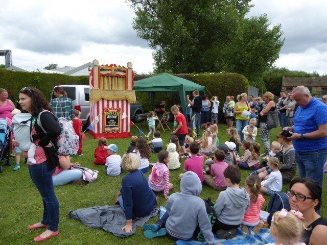 Family audience enjoying traditional entertainment