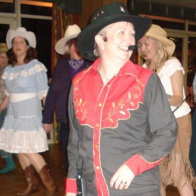 Line dancing at a Jolly Good Productions event