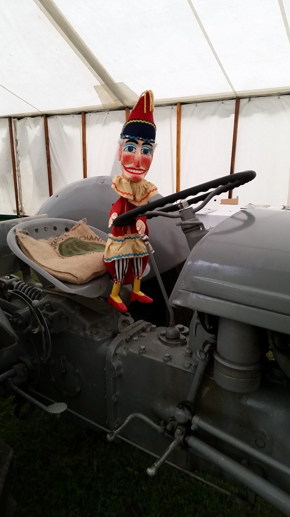 Mr Punch sitting aboard a tractor at the Beamish Agricultural Show in September 2015