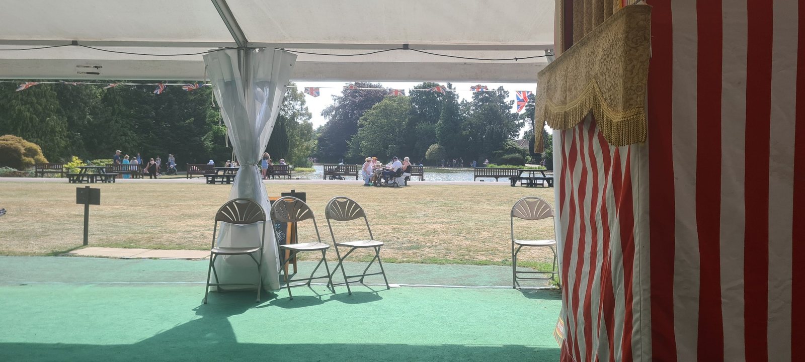 View from the entertainment marquee across Burnby Hall Gardens with the Punch and Judy theatre at the side