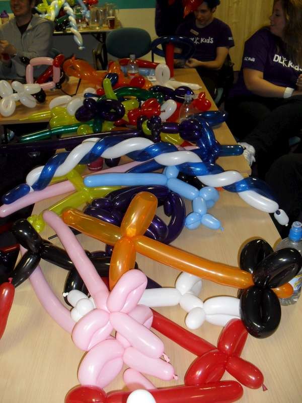 A table covered with balloon models made during the training course