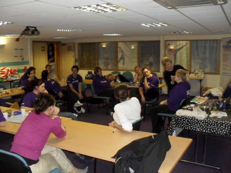 David Lloyd staff practising face painting techniques during the training day