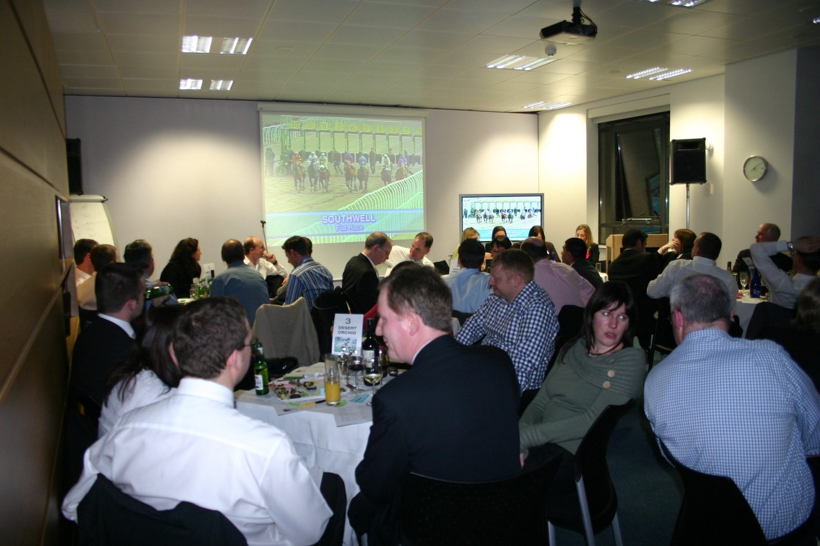 Guests enjoying the Eversheds corporate Race Night in Leeds