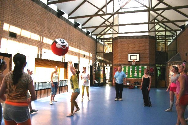 Hen-party guests playing Keepy-Uppy with a giant Disney Balzac ball