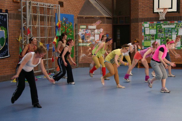 Hen-party guests enjoying line dancing during a Jolly Good Productions session in Scotland