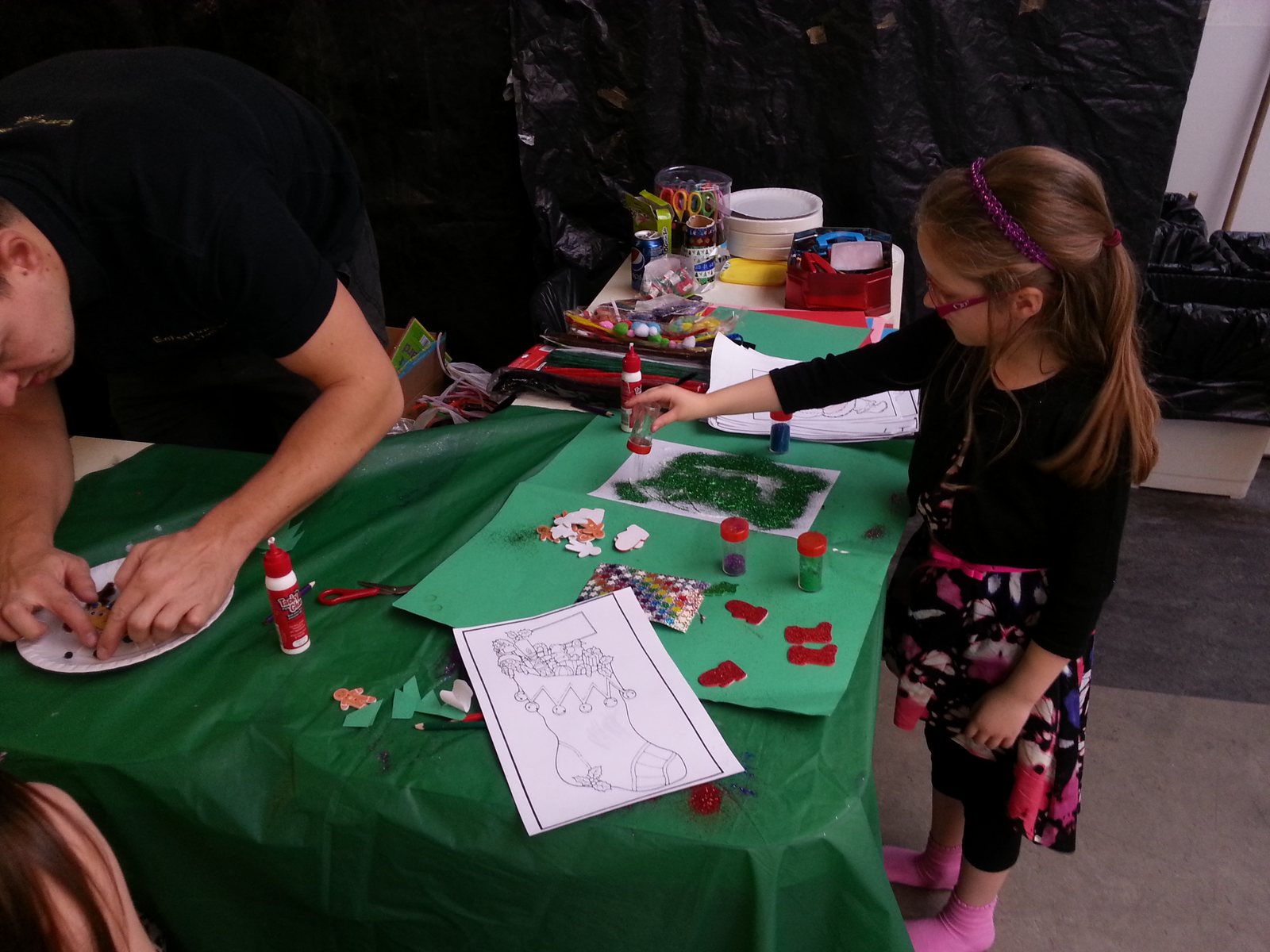 Child taking part in the Christmas craft workshop at NSK Bearings